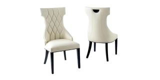 Tremiti Pair Of Cream Leather Quilted Dining Chairs With Black Lacquer Legs And Details