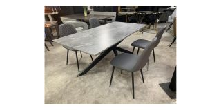 1.8m Mat Grey Ceramic Dining Table With 4 Grey Faux Leather Quilted Front Dining Chairs With Black Legs - Chair(w46 d54 h87)
